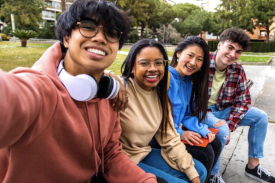 Group of students posing for a selfie Group of students posing for a selfie